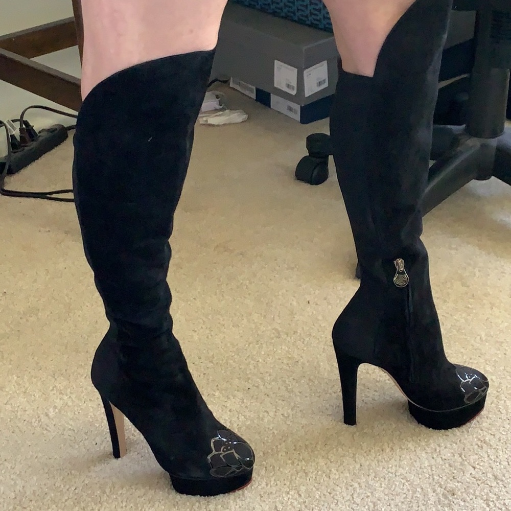 the sexiest black boots. seriously so adorable!